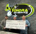 From left, Brady Vondra, Fire Chief Simmons, Paul Budden