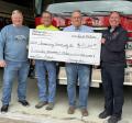 Pictured from left, Paul Budden, Ed Faherty, Greg Faherty, Fire Chief Ryan Simmons