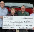 Pictured: Bernie Bernhardt, Linda Bernhardt, Paul Budden and Fire Chief Ryan Simmons