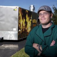 Chef Shaun Stecklein of Downtown BBQ and his smokin’ hot BBQ trailer. Photo by markhirschphoto@gmail.com
