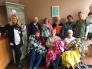 Presenting handmade blankets to St. Croix Hospice