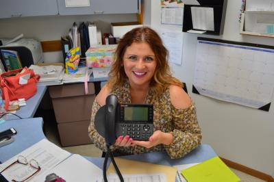 Administration Director Valerie Martin with New Phone