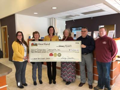 Heartland Credit Union Staff presenting check to Legion Park Event Center Committee
