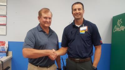 Pictured left to right:  Gene Weber (Inspiring Community) and Josh Ovsak (Platteville Walmart Store Manager)