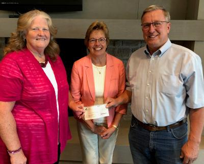 Pictured left to right: Sheri Engelke (LPEC president), Sheila and Myron Tranel