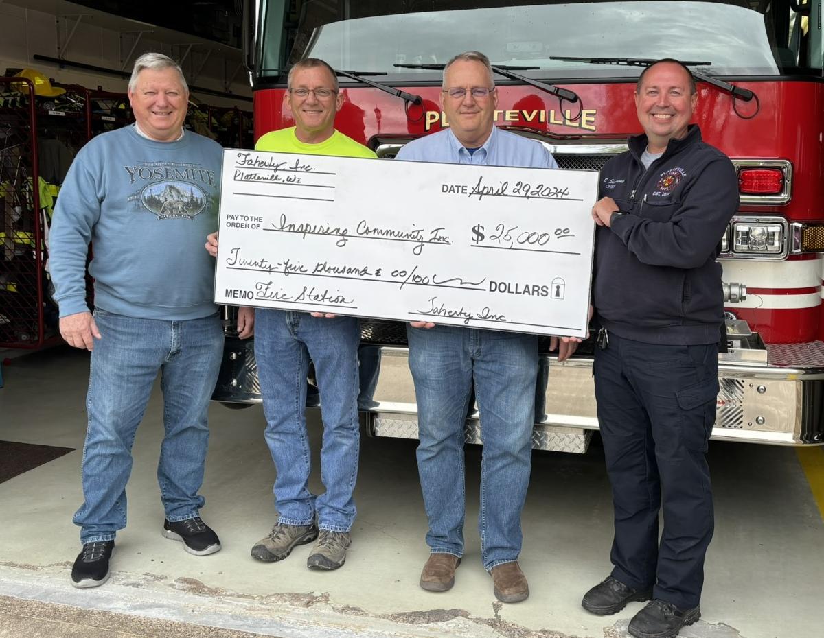 Pictured from left, Paul Budden, Ed Faherty, Greg Faherty, Fire Chief Ryan Simmons