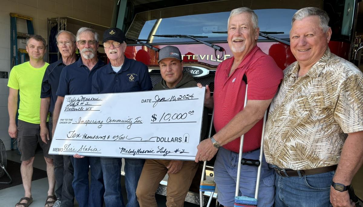 Pictured from left: John Fick, Dave Schmoekel, Jim Beals, John Harvey, Sam Gomez, Jeff Scott, Paul Budden