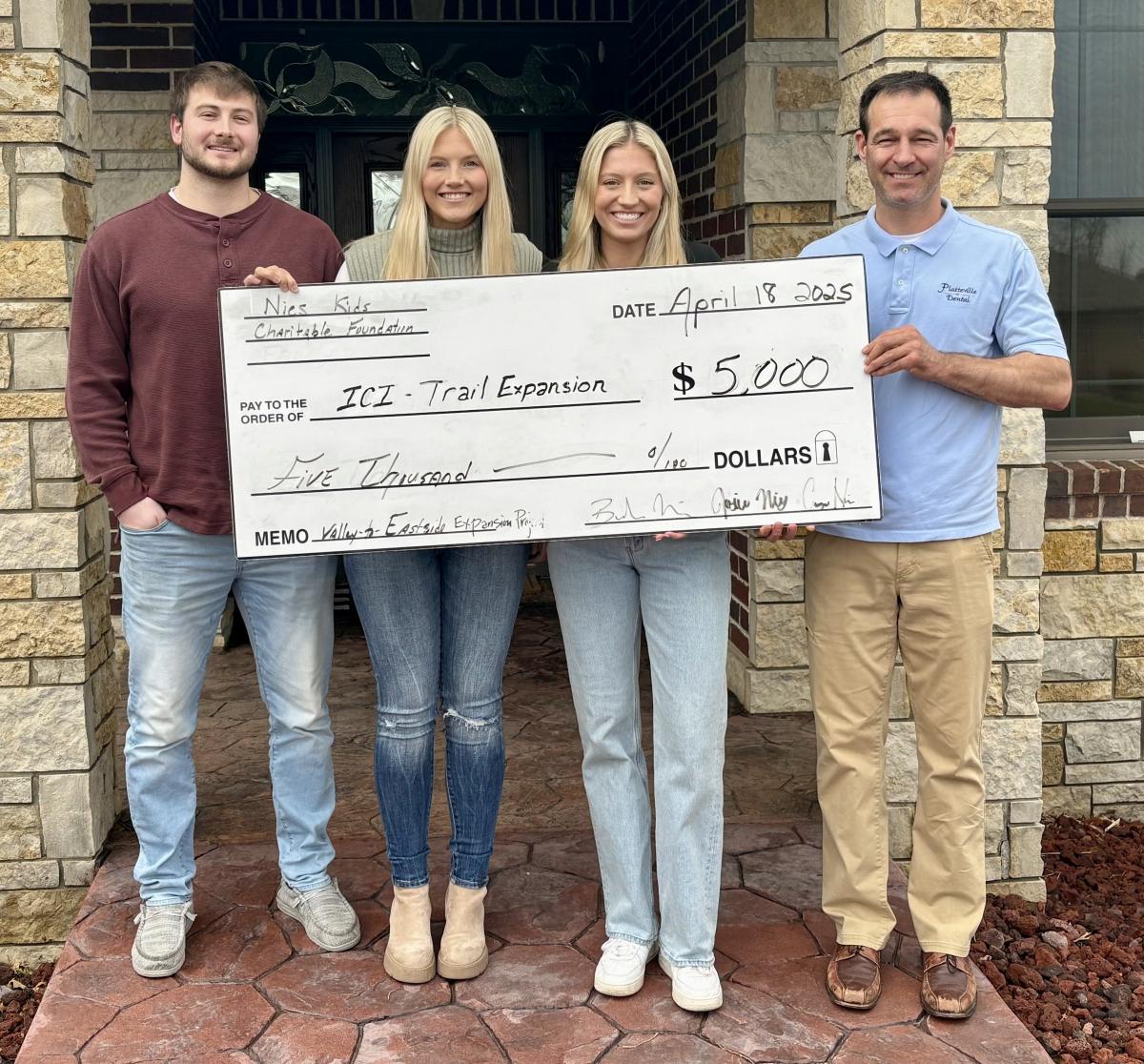 Pictured (L-R): Braden Nies, Josie Nies, Camryn Nies, & Joe Jacquinot (PCA President)